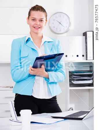 Businesswoman is signing contract 76577475