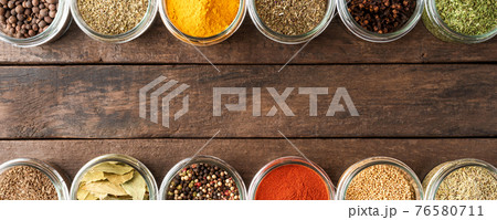 Various types of seasonings in bowls. Collection of seasonings on wooden background with copyspace. Panoramic banner Various types of seasonings in bowls. Collection of seasonings on wooden background with copyspace. Panoramic banner 76580711
