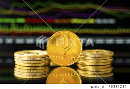 Gold ethereum coin with a graph chart. Trading on the cryptocurrency exchange. Cryptocurrency Stock Market Concept. Virtual money concept. Mining or blockchain technology. 76585252