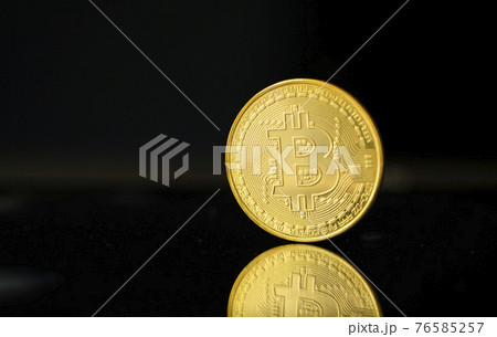 Gold bitcoin coin. Trading on the cryptocurrency exchange. Cryptocurrency Stock Market Concept. Virtual money concept. Mining or blockchain technology. 76585257
