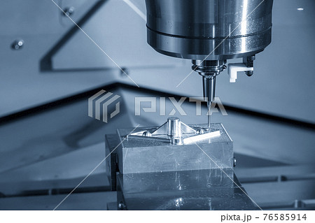 The  CNC  milling machine cutting  the mold parts by solid ball  end-mill tool.  76585914