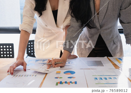 Group of Businessman and Accountant checking data document on digital tablet for investigation of corruption account . Anti Bribery concept 76589012