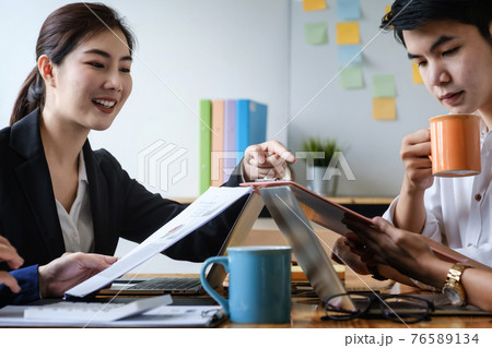Group of Businessman and Accountant checking data document on digital tablet for investigation of corruption account . Anti Bribery concept. selecetive focus Group of Businessman and Accountant checking data document on digital tablet for investigation of corruption account . Anti Bribery concept. selecetive focus 76589134