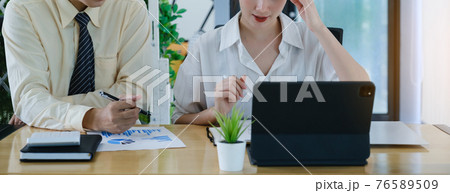 Fund managers team consultation and discuss about analysis Investment stock market by data document. Fund managers team consultation and discuss about analysis Investment stock market by data document. 76589509