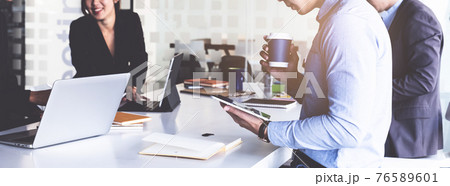 Group of Businesswoman and Accountant checking data document on digital tablet for investigation of corruption account . Anti Bribery concept. Group of Businesswoman and Accountant checking data document on digital tablet for investigation of corruption account . Anti Bribery concept. 76589601
