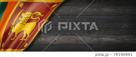 Sri Lanka flag on black wood wall banner Sri Lanka flag on black wood wall banner 76590991