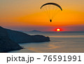 paraglider pilot fly in sky on beauty nature mountain and sea landscape 76591991