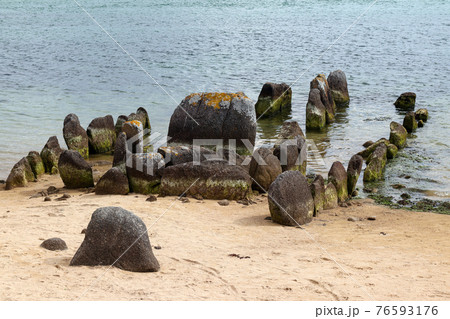 Ruins of the Dolmen of Guinirvit, Bay of Kernic, Plouescat, Finistere, Brittany, France Ruins of the Dolmen of Guinirvit, Bay of Kernic, Plouescat, Finistere, Brittany, France 76593176