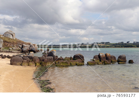 Ruins of the Dolmen of Guinirvit, Bay of Kernic, Plouescat, Finistere, Brittany, France Ruins of the Dolmen of Guinirvit, Bay of Kernic, Plouescat, Finistere, Brittany, France 76593177