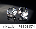 Couple of wonderful pure diamonds with reflections on black mirror background close up view. Jewelry diamonds sale, invitation, action, discount banner, poster, card template with copy space 76595674