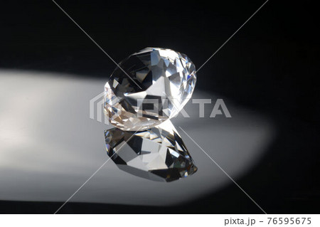 Excellent diamond of the first water with reflection on black mirror background close up view. Jewelry diamonds sale, invitation, action, discount banner, poster, card template with copy space Excellent diamond of the first water with reflection on black mirror background close up view. Jewelry diamonds sale, invitation, action, discount banner, poster, card template with copy space 76595675