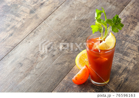 Bloody Mary cocktail in glass and ingredients 76596163