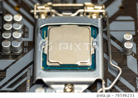 Central processing unit closeup computer part closeup 76596233