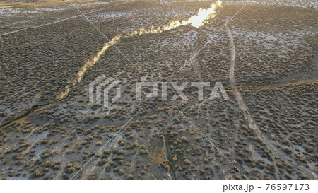 Morning time drone view hot springs on the desert valley 76597173