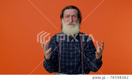 Frustrated elderly bearded man screams from stress tension problems feels horror hopelessness fear Frustrated elderly bearded man screams from stress tension problems feels horror hopelessness fear 76598362