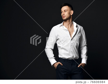 Portrait of young self-confident businessman in 76606984