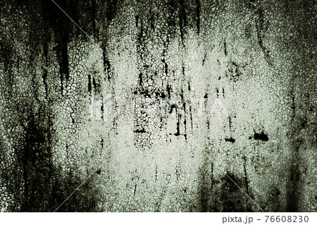 Abstract horror old empty ragged painted metal cracked grunge scary dark mystical monochrome background with veined texture with strange light 76608230