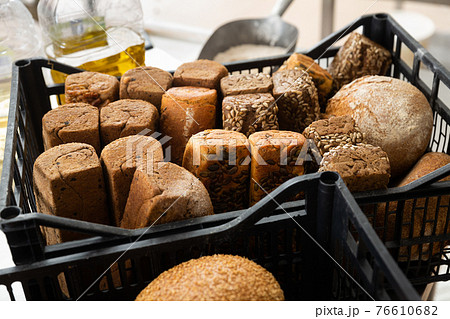 bread with cereals in baking black box in kitchen 76610682