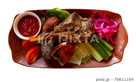 Kazan kebab, slowly stewed young lamb with vegetables Kazan kebab, slowly stewed young lamb with vegetables 76611204