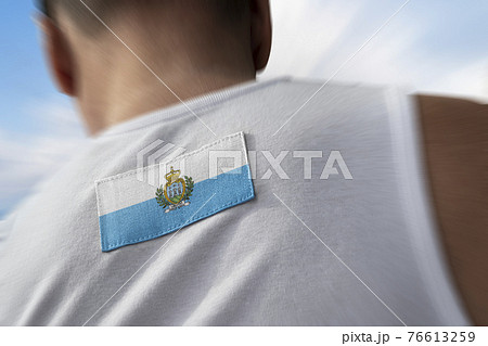 The national flag of San Marino on the athlete's back The national flag of San Marino on the athlete's back 76613259