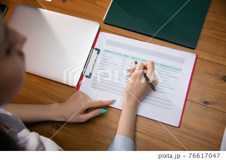 Close up manager working in modern office using devices and gadgets during creative meeting 76617047