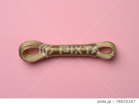 twisted clothesline on pink background twisted clothesline on pink background 76620267