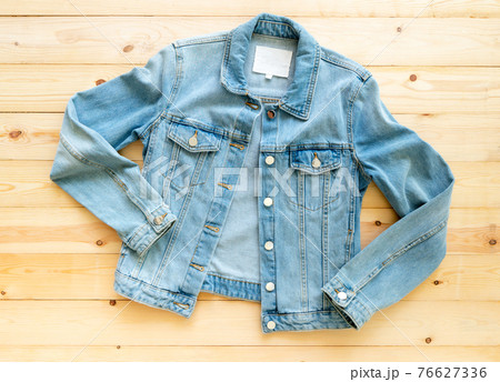 flat lay, Denim jacket jeans mockup on brown wooden background. Template, 76627336