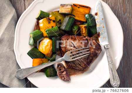Fillet of beef with mixed vegetables. High quality photo. Fillet of beef with mixed vegetables. High quality photo. 76627606