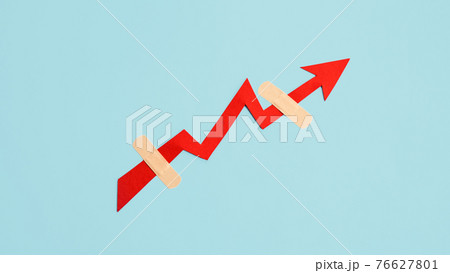 Global economy recovery, Business Economic growth. Financial, industrial and market sector comeback and upturn concept. Paper red arrow graph with medical plaster going upward in blue background 76627801