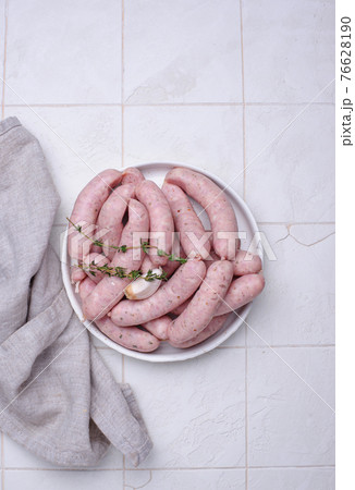 Raw uncooked sausages for grilled Raw uncooked sausages for grilled 76628190