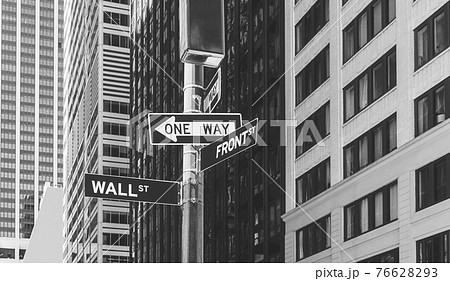 Wall Street, Front Street and One Way signs, selective focus, New York City, USA. 76628293