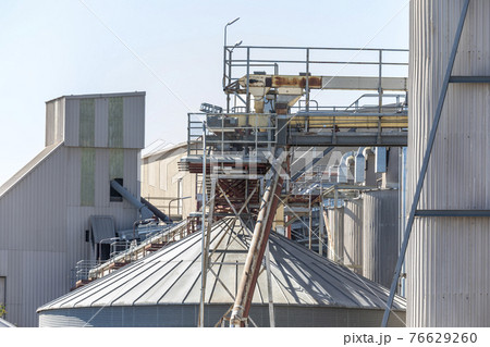 Storage tanks and catwalk at a large flour mill 76629260