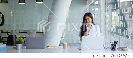 Fund managers researching and analysis Investment stock market by laptop computer. 76632925