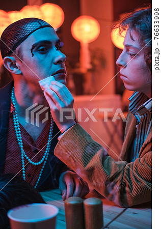 Woman helping her transgender friend 76633998