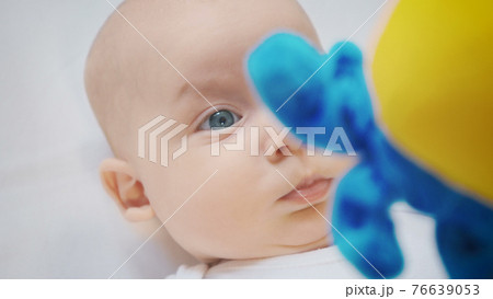 Photo of surprised baby four month girl 76639053