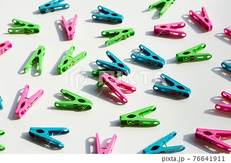 Plastic clothespin on white background. Plastic clothespin on white background. 76641911