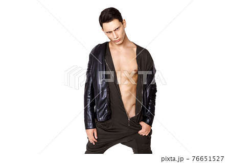Strong muscle beautiful stripped male model in fashion cloathes on white isolated fontk background 76651527