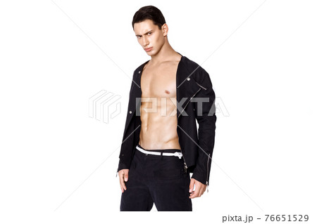 Strong muscle beautiful stripped male model in fashion cloathes on white isolated fontk background 76651529