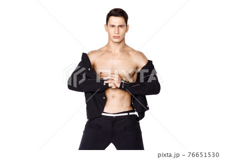 Strong muscle beautiful stripped male model in fashion cloathes on white isolated fontk background Strong muscle beautiful stripped male model in fashion cloathes on white isolated fontk background 76651530