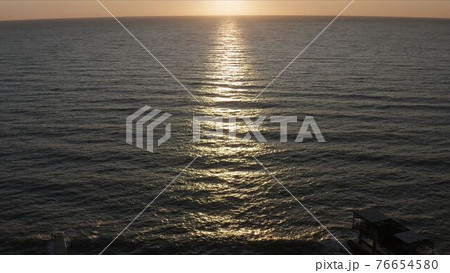 Beautiful sunrise on the Black Sea. blue sea Beautiful sunrise on the Black Sea. blue sea 76654580