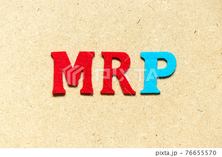 Color cloth alphabet letter in word MRP (Abbreviation of Material requirements planning) on wood background 76655570