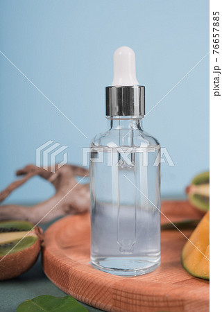 Natural organic cosmetic bottle mock up with leaves and fruit.blank bottle for branding 76657885