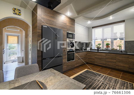Modern luxurious dark brown, gray and black kitchen details Modern luxurious dark brown, gray and black kitchen details 76661306