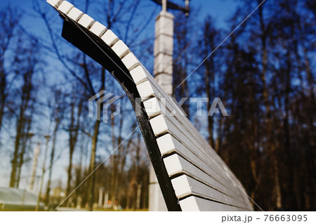 wooden bench outdoor 76663095