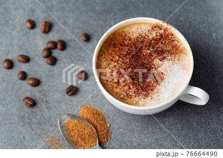 Appetizing fresh cappuccino in cup 76664490