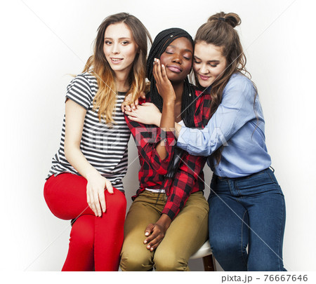 diverse multi nation girls group, teenage friends company cheerful having fun, happy smiling, cute posing isolated on white background, lifestyle people concept, african-american and caucasian diverse multi nation girls group, teenage friends company cheerful having fun, happy smiling, cute posing isolated on white background, lifestyle people concept, african-american and caucasian 76667646
