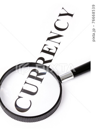 headline currency and magnifier 76668539