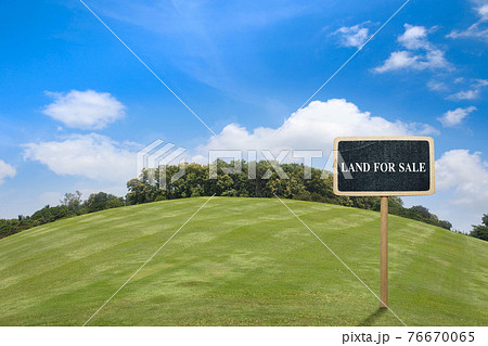 Building land for new construction project on green meadow, plot for construction area. Building land for new construction project on green meadow, plot for construction area. 76670065