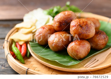 Thai sausage or Isan sausage (grilled fermented rice with minced pork) Thai sausage or Isan sausage (grilled fermented rice with minced pork) 76672529