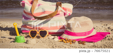 Accessories for relax or sunbathing and children toys for playing on beach. Travel and vacation time Accessories for relax or sunbathing and children toys for playing on beach. Travel and vacation time 76675021
